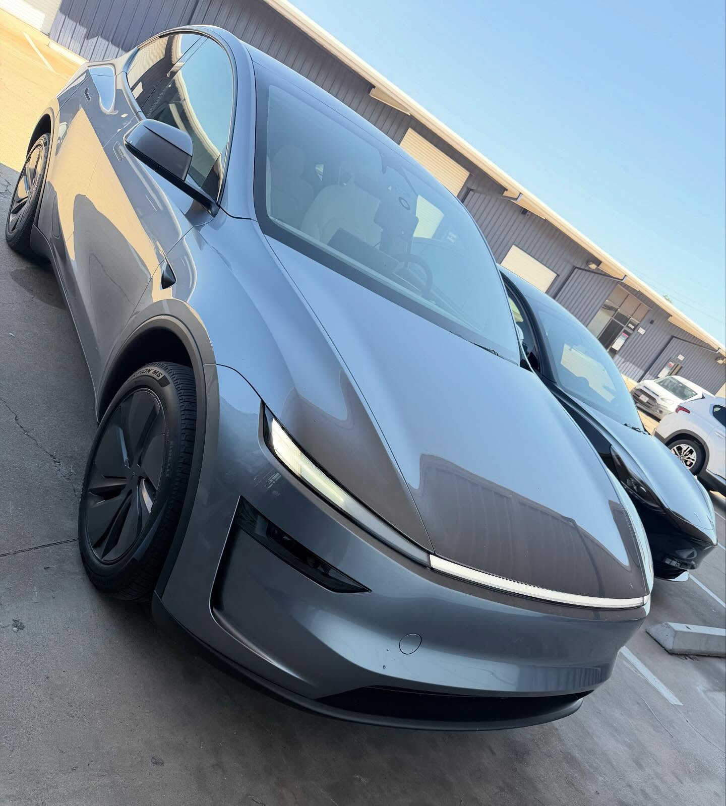 tesla with spray wrap
